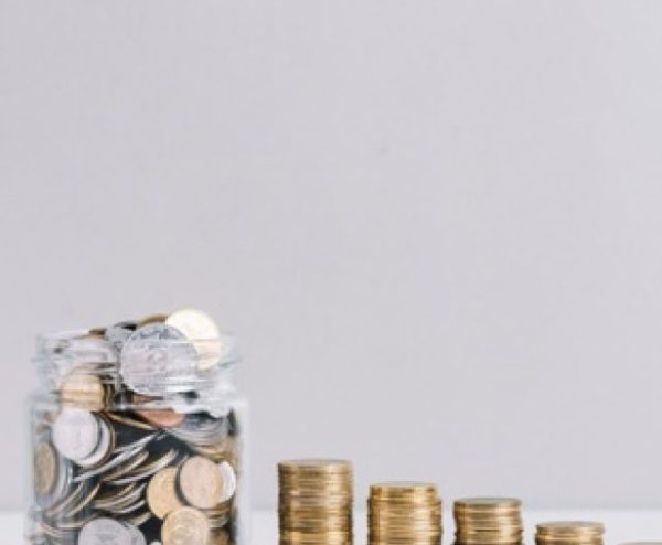 glass-jar-full-money-front-decreasing-stacked-coins-against-white-background_23-2147919228